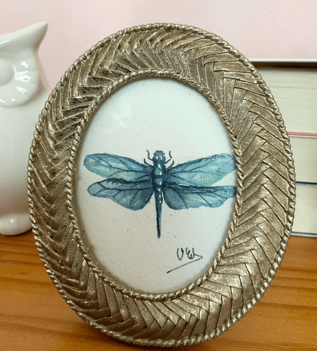 Libellule bleue dans son cadre miniature doré