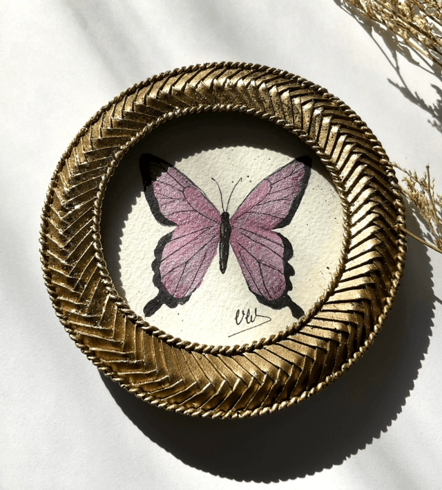 Papillon parme irisé dans son cadre miniature doré