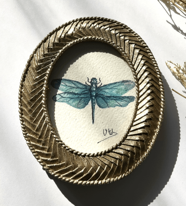 Libellule bleue dans son cadre miniature doré